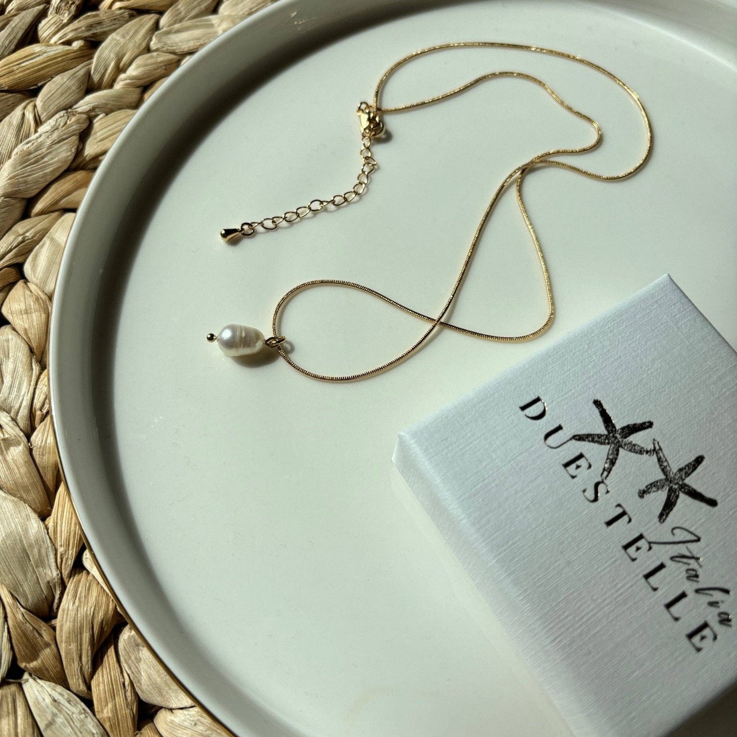 Collana serpente con perla di fiume - Maravigghia Sicily